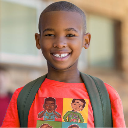 Young Black boy wearing a red Fearlessly Hue T-shirt with four Fearlessly Hue characters on it.