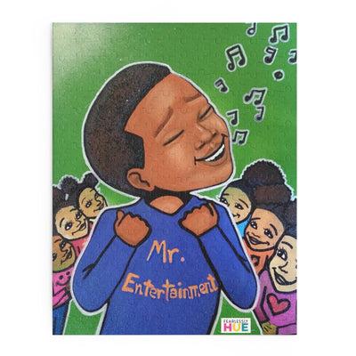 Mr. Entertainment puzzle by Dana Todd Pope: a boy in a shirt that reads Mr. Entertainment sings with his eyes closed while his friends cheer
